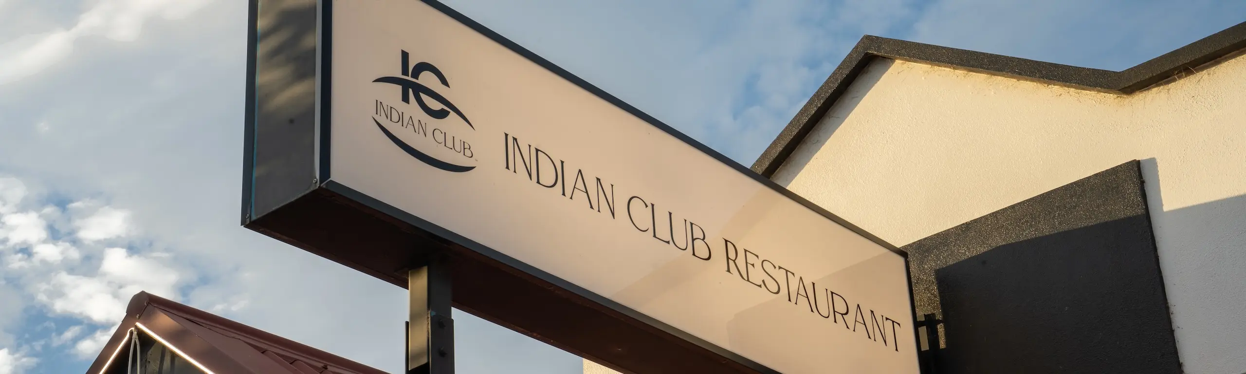 Indian Club SA sign board in front of the shop.