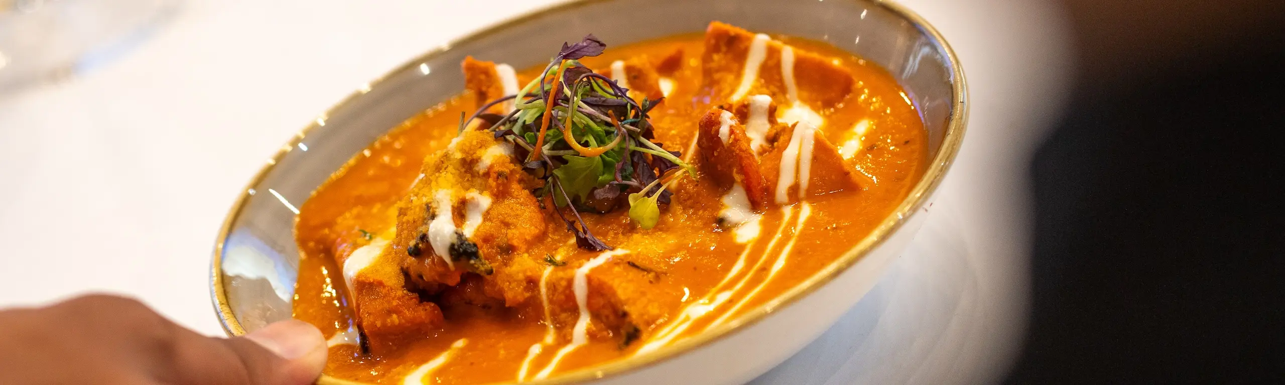 Meal being served to client's table.